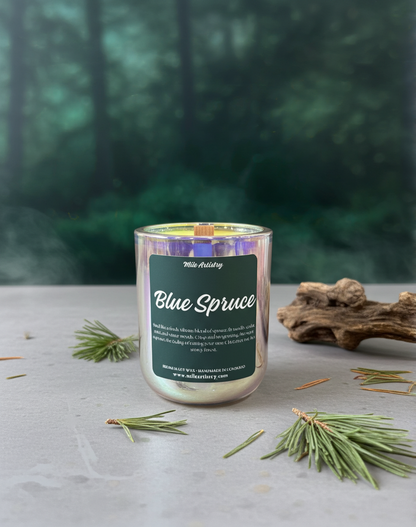 Candle labeled 'Blue Spruce' with a forest background